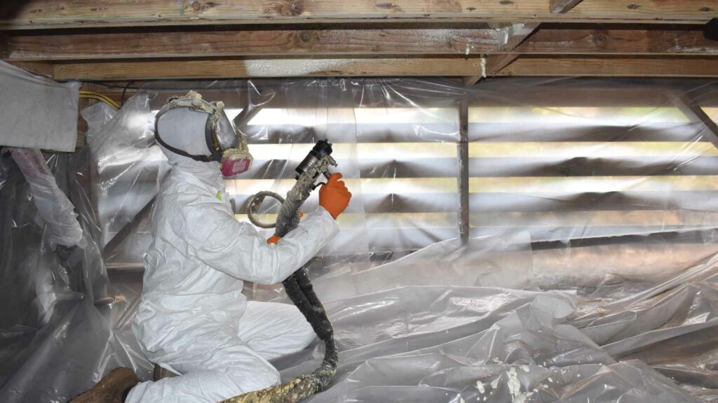 Spraying Foam Insulation in Maui home basement